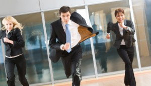people in suits running